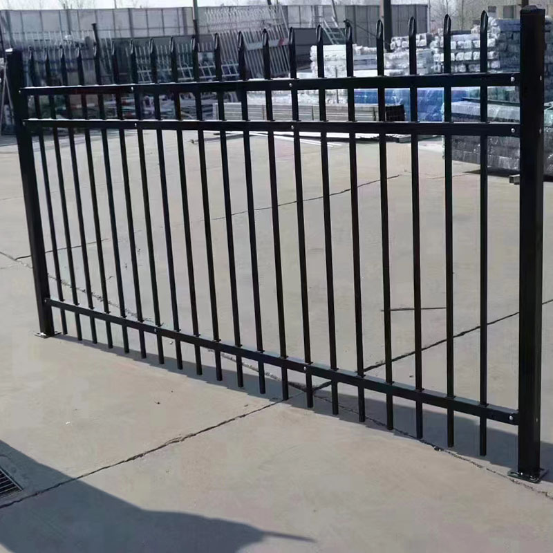 Custom residential metal fence being welded