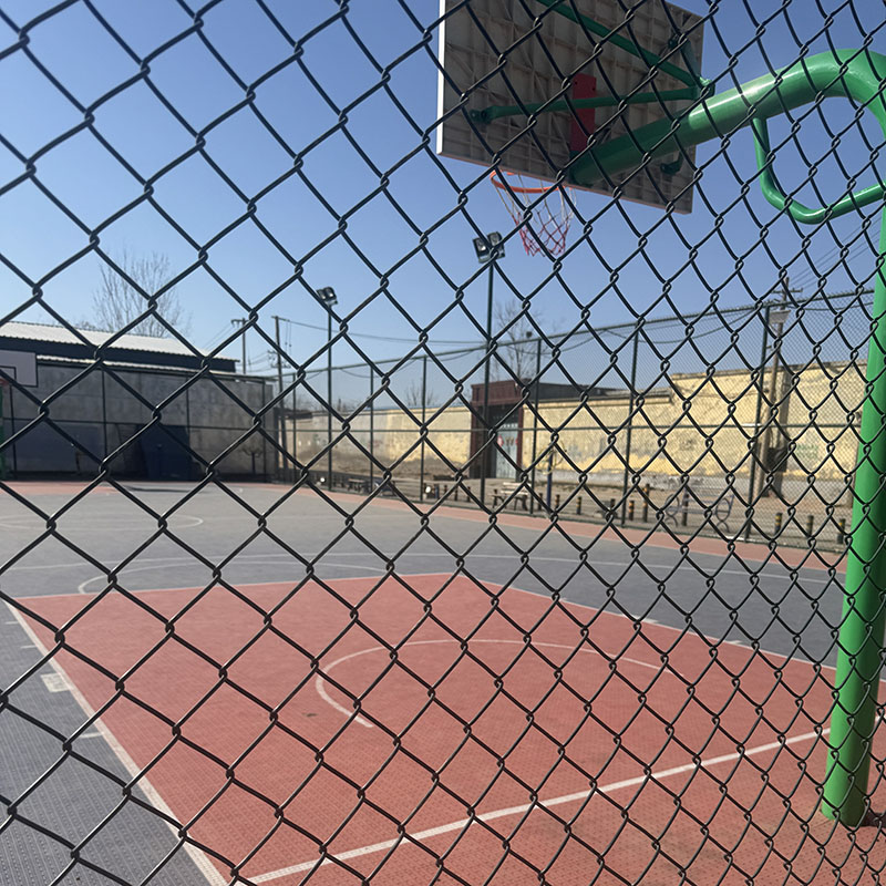 White stadium fence being assembled