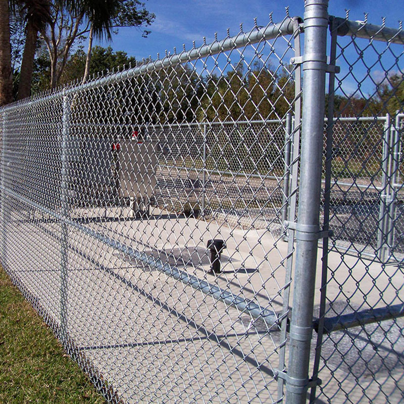 Chain link fence frame guardrail is being welded