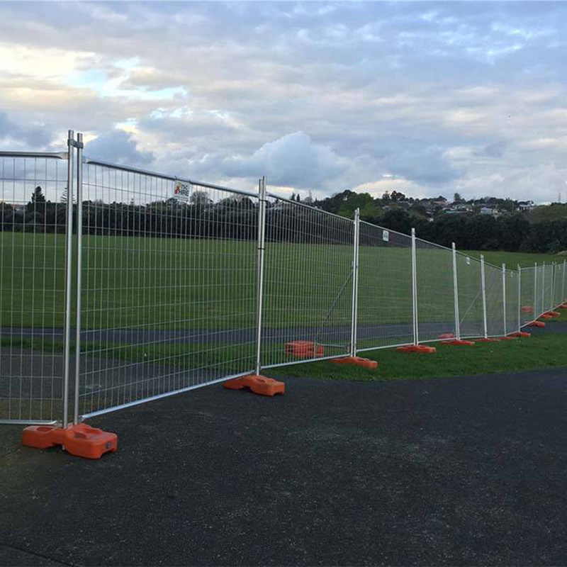 Temporary fence is being welded