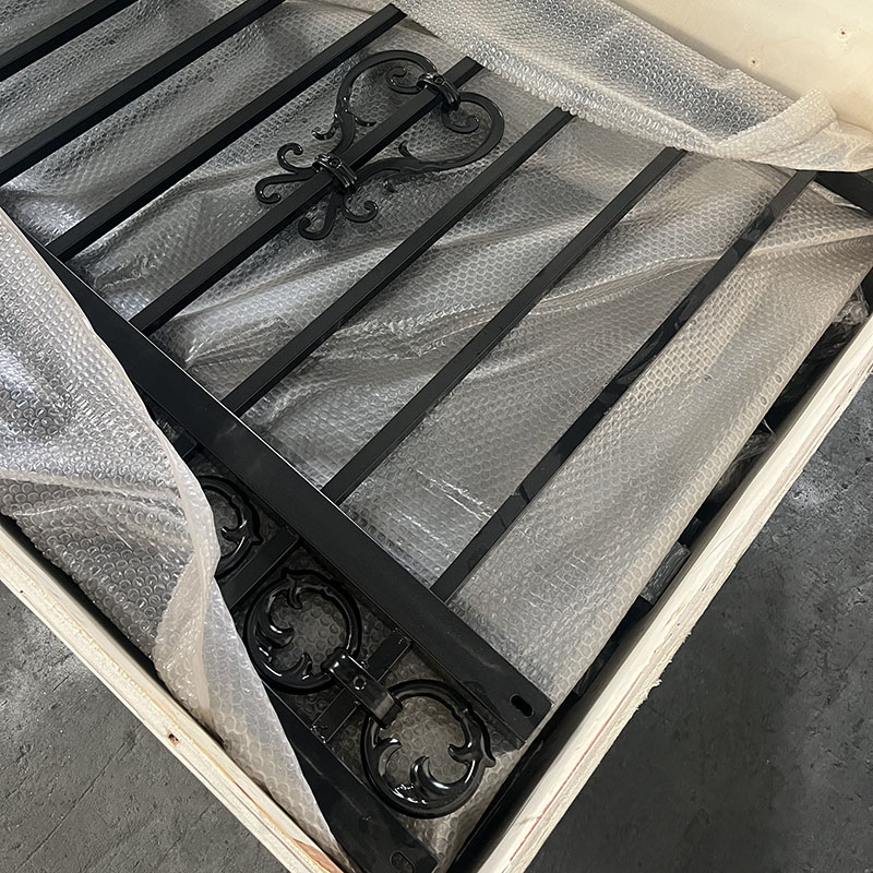 Iron fence packed with wooden boxes for delivery