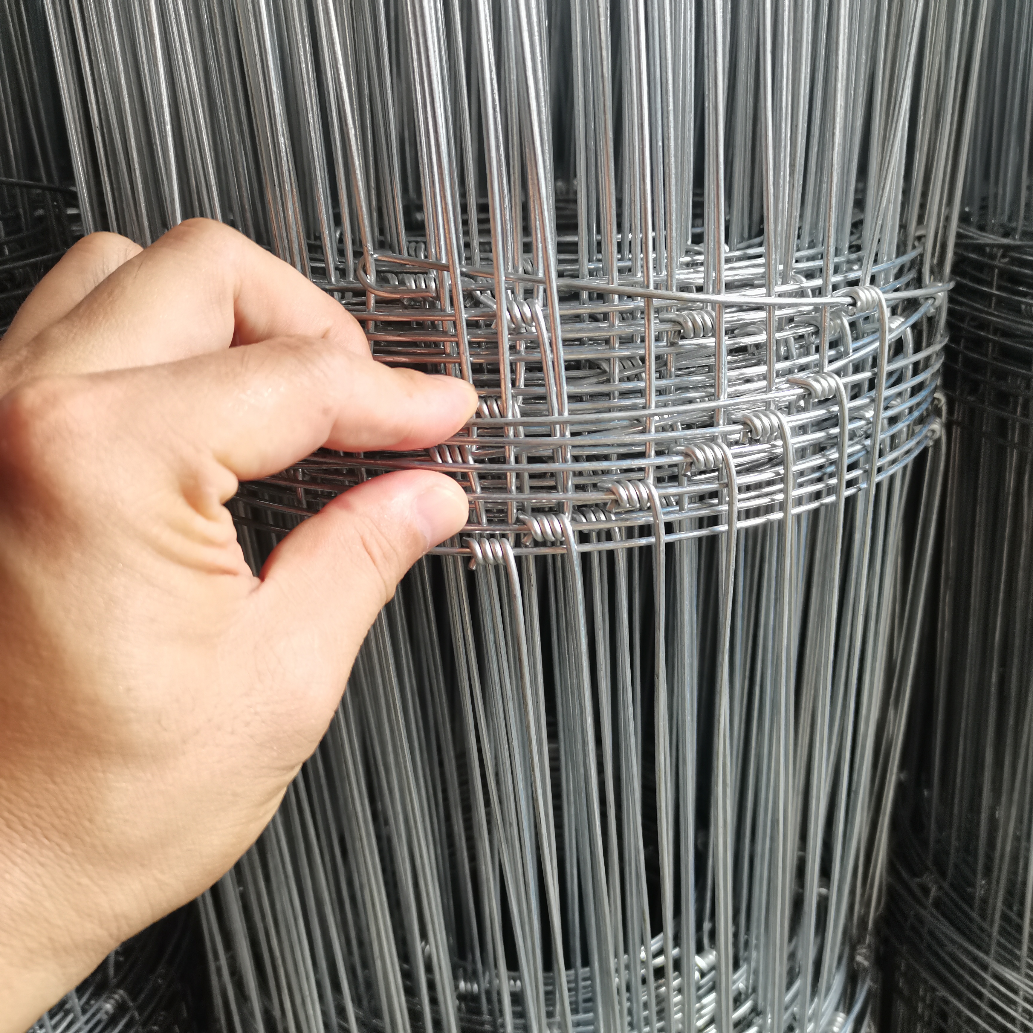 High-speed production of cattle fence net