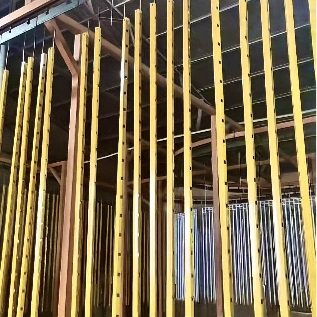 Yellow crossbeams are being powder-coated